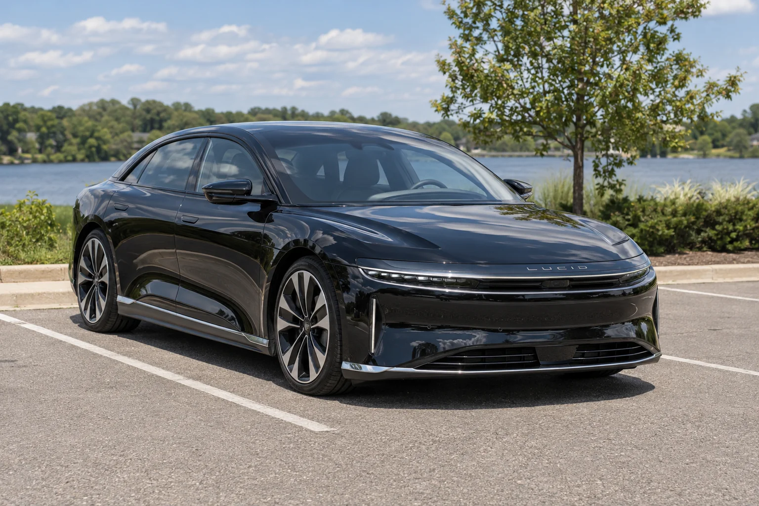 Gloss black Lucid Air sedan with tinted windows at OnPoint Tintz