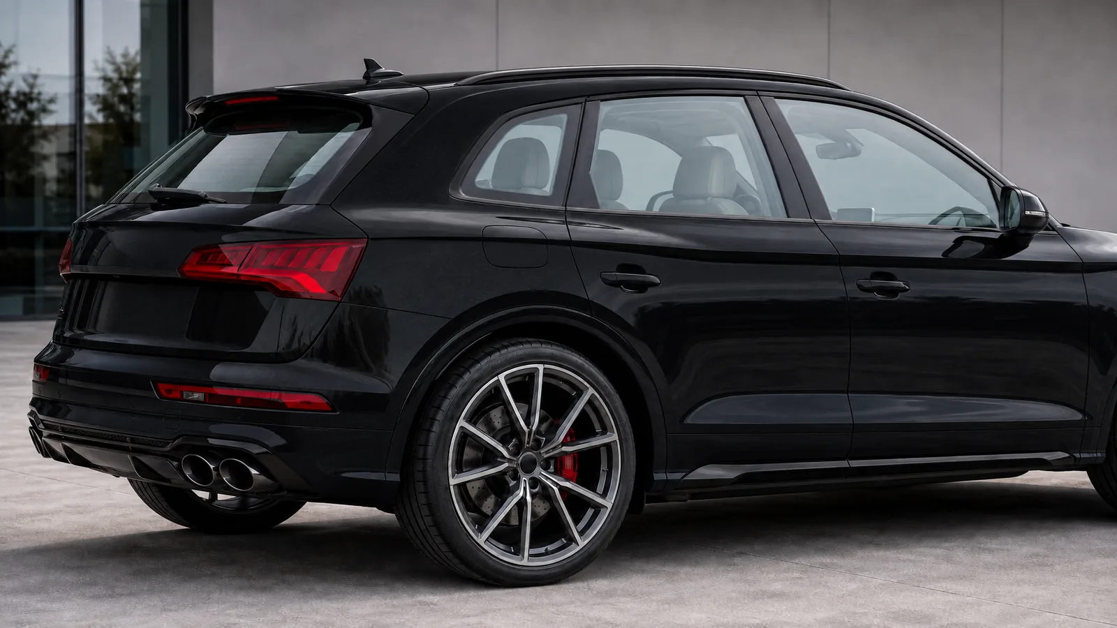 A dark Audi SQ5 with clear glass, shown at 35% tint